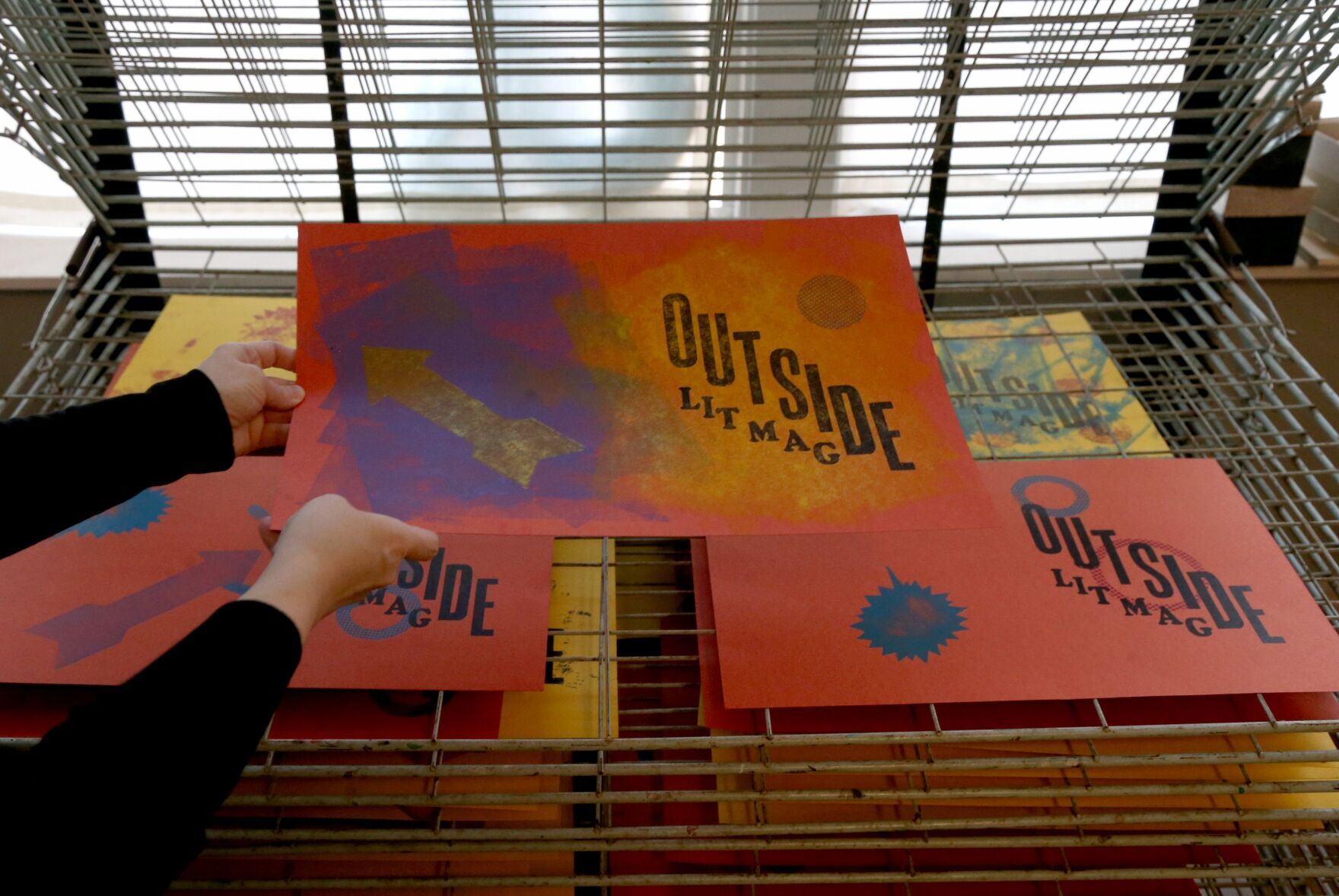 Student Magazine Staff Create Covers Outside Literary Magazine